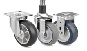 A close-up image of three industrial caster wheels featuring swivel casters with different mounting styles, including plate-mounted and stem-mounted designs, showcasing versatility for various applications.