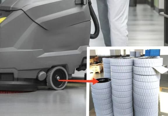 Rubber wheels on a floor scrubber