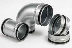 product photo of galvanized spiral duct fittings with integrated black EPDM rubber gaskets — includes straight connector, 90-degree elbow, and double-lipped coupling — rubber seals are embedded in the inner wall grooves of the metal fittings
