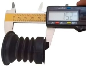 Molded rubber part measured with digital caliper, showing length 45.2 mm, black bellows seal, precision tolerance inspection.
