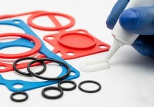 RTV vs silicone rubber, red and black gaskets and O-rings, adhesive application, material difference demonstration.