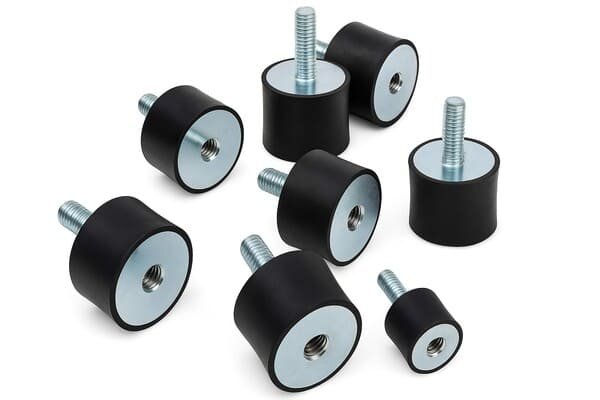 Anti-vibration mounts, cylindrical rubber with threaded studs and inserts, used for machinery vibration isolation and noise reduction.