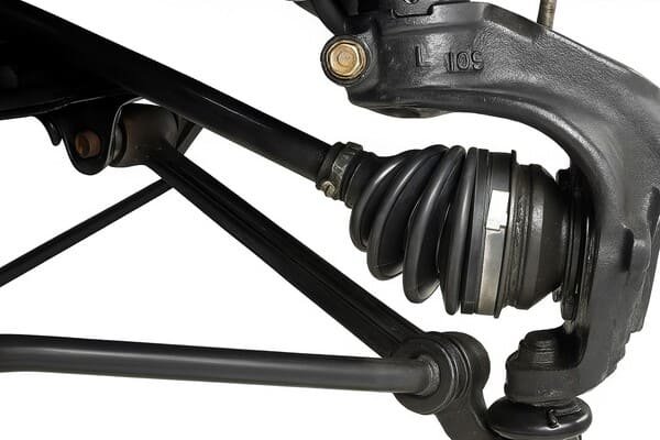 A car has four CV boots—two inner boots near the transmission and two outer boots near the wheels