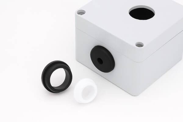 T-seal installation in housing block, black and white polymer sealing rings fitted into mechanical groove for reliable hydraulic and pneumatic sealing.