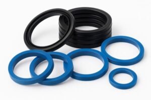 Different types of piston lip seals in black and blue elastomer materials, hydraulic sealing rings for cylinders, wear-resistant and pressure-proof.