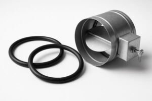 Spliced O-ring applications, large rubber sealing rings placed beside a metal duct damper, flexible solution for HVAC and industrial sealing.